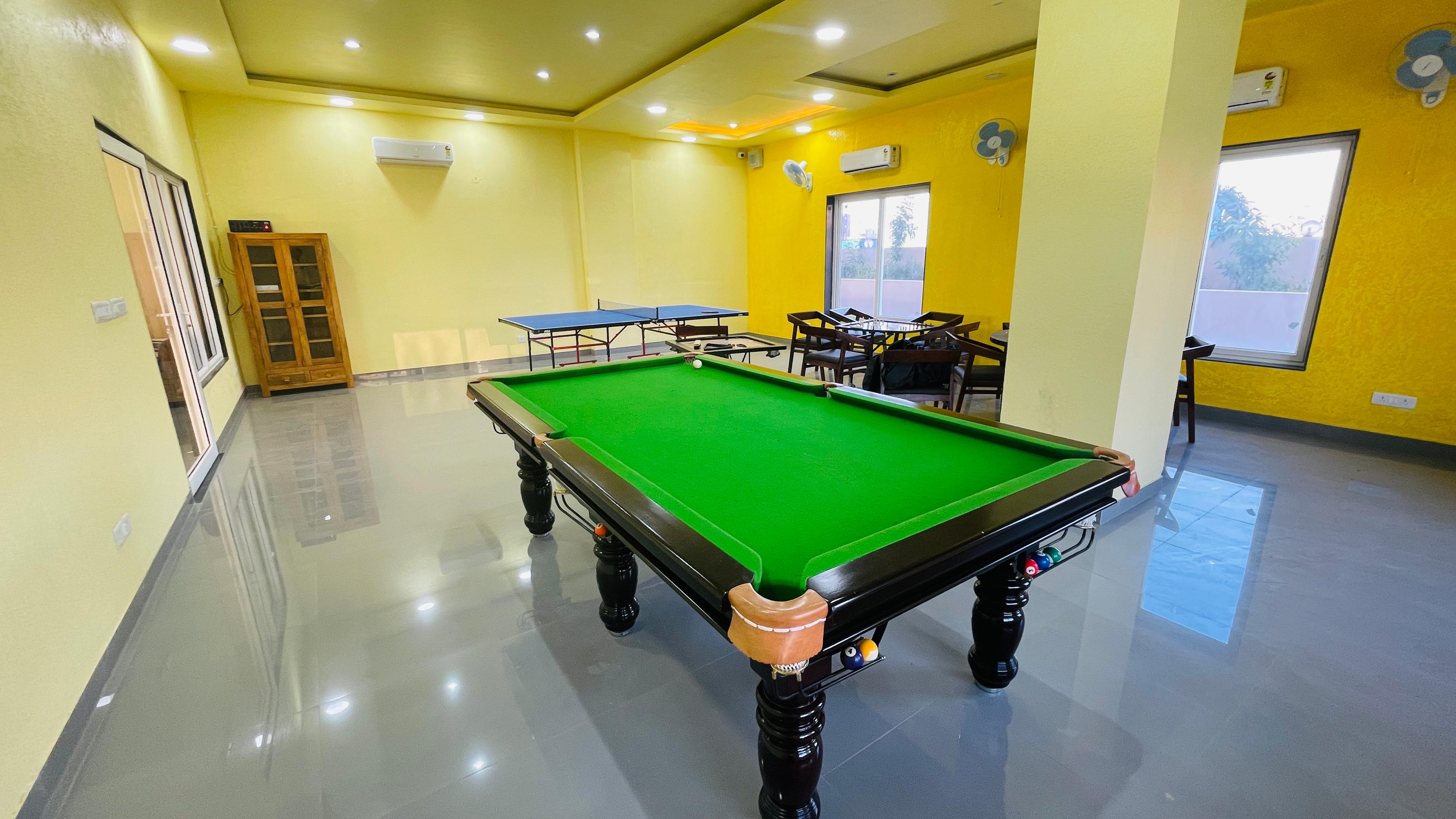 Clubhouse at The City Nook - Recreational Area with Pool Table and Table Tennis Facilities