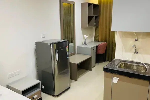Solitaire Suites Fridge and Desk